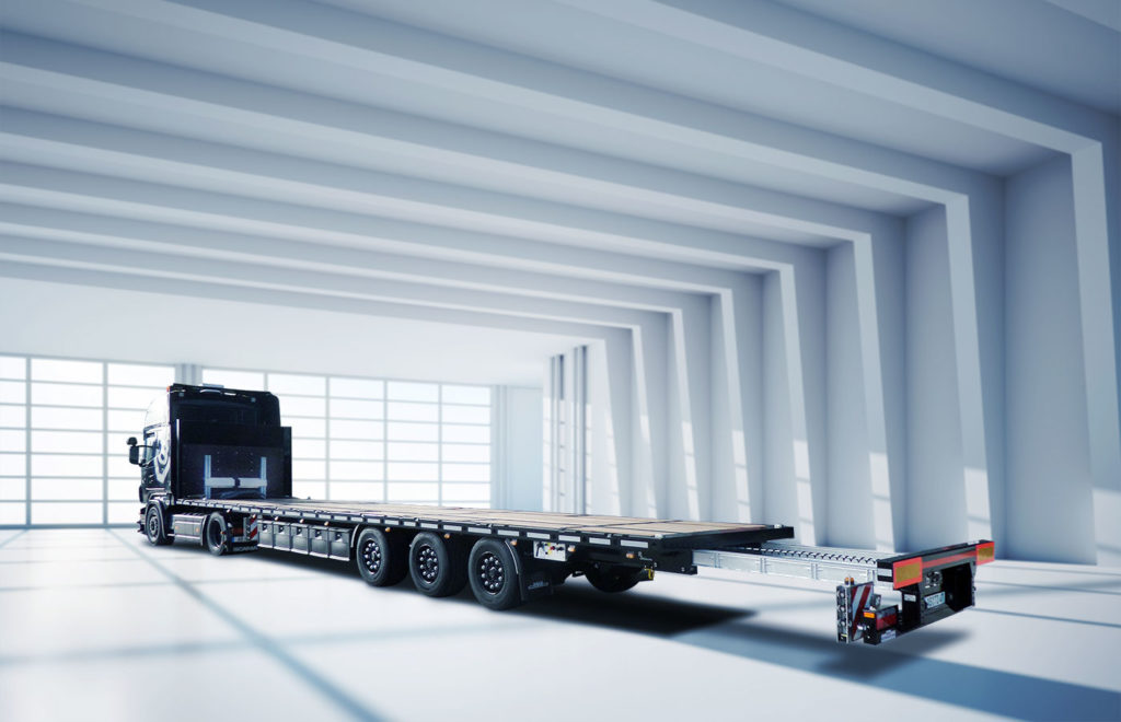 3-axle MEGA plateau with container locks and rear extension.